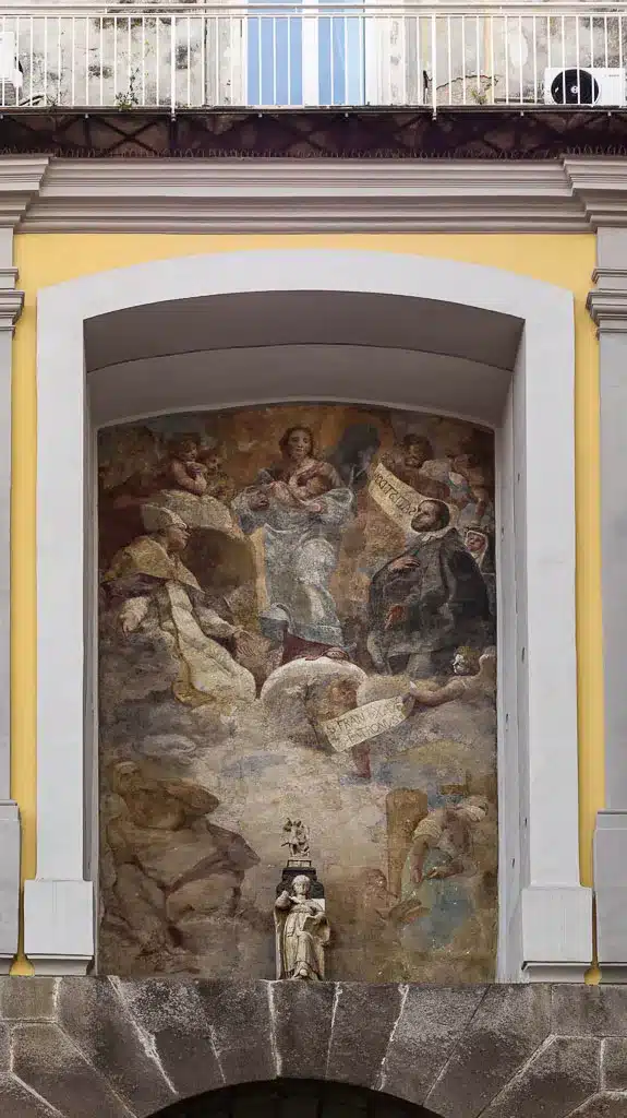 The frescoes on the Gate of San Gennaro entrance to Naples walled city
