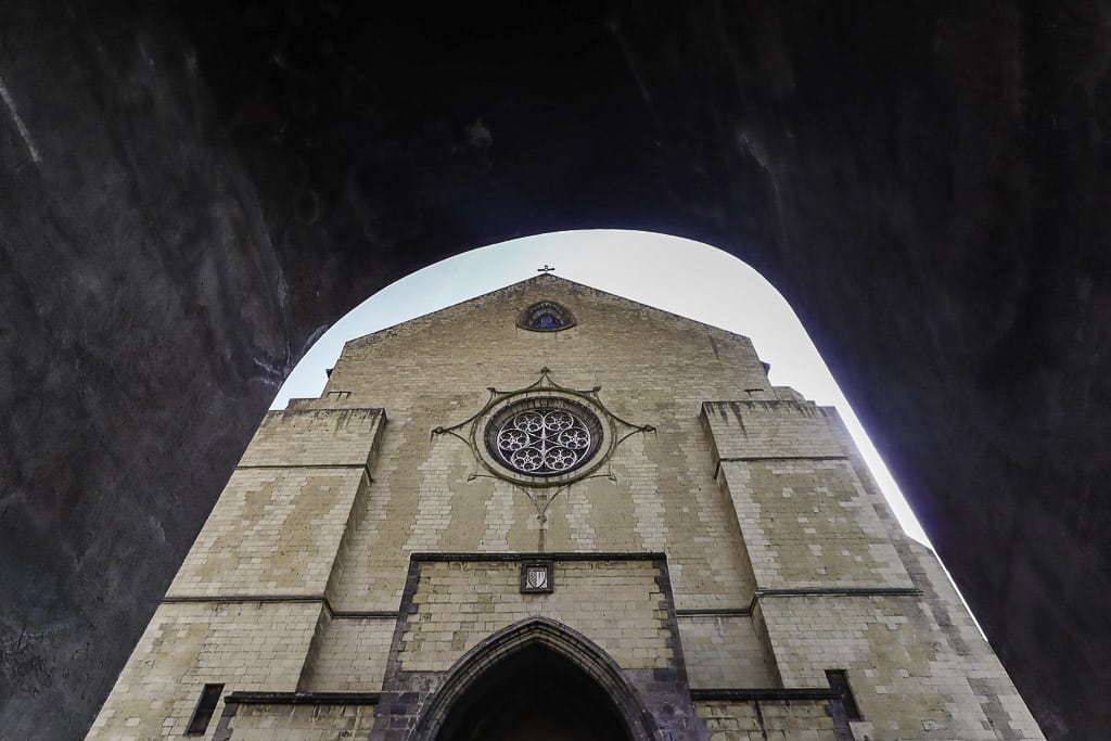Santa Chiara Cloister Naples: Complete Local Guide to Naples’ Majolica Masterpiece 9 Arch of Santa Chiara Church complex - Naples old town walk